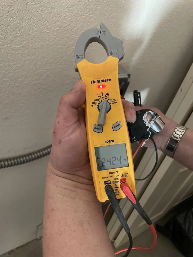 Voltage testing with clamp meter during Circuit Breaker Repair in Asbury Park